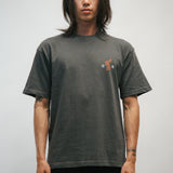 Person wearing a dark gray t-shirt with a small Korean tiger and 광복 on the front on a plain background