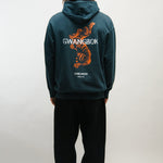 Person wearing a teal hoodie with 'GWANGBOK' branding on the back, standing against a white background.