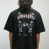 Person wearing a black t-shirt with white graphics and text Gwangbok on the back, standing against a plain background.