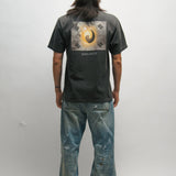 Person wearing a black t-shirt with a Korean Flag graphic design on the back, standing against a plain background.