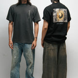 Two male models wearing black and dark grey t-shirts with Korean Flag graphic designs, one facing forward and one facing backward.