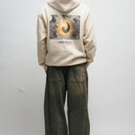 Person wearing a beige hoodie with a Korean Flag graphic design on the back against a white background